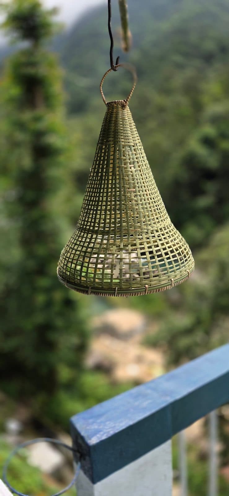 Cone-shaped bamboo shade with narrow woven neck
