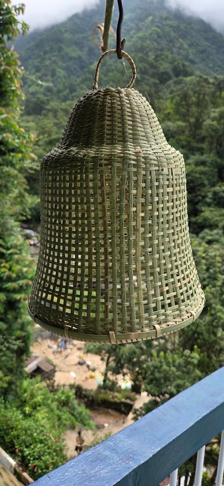 Elongated bell pendant shade in natural bamboo