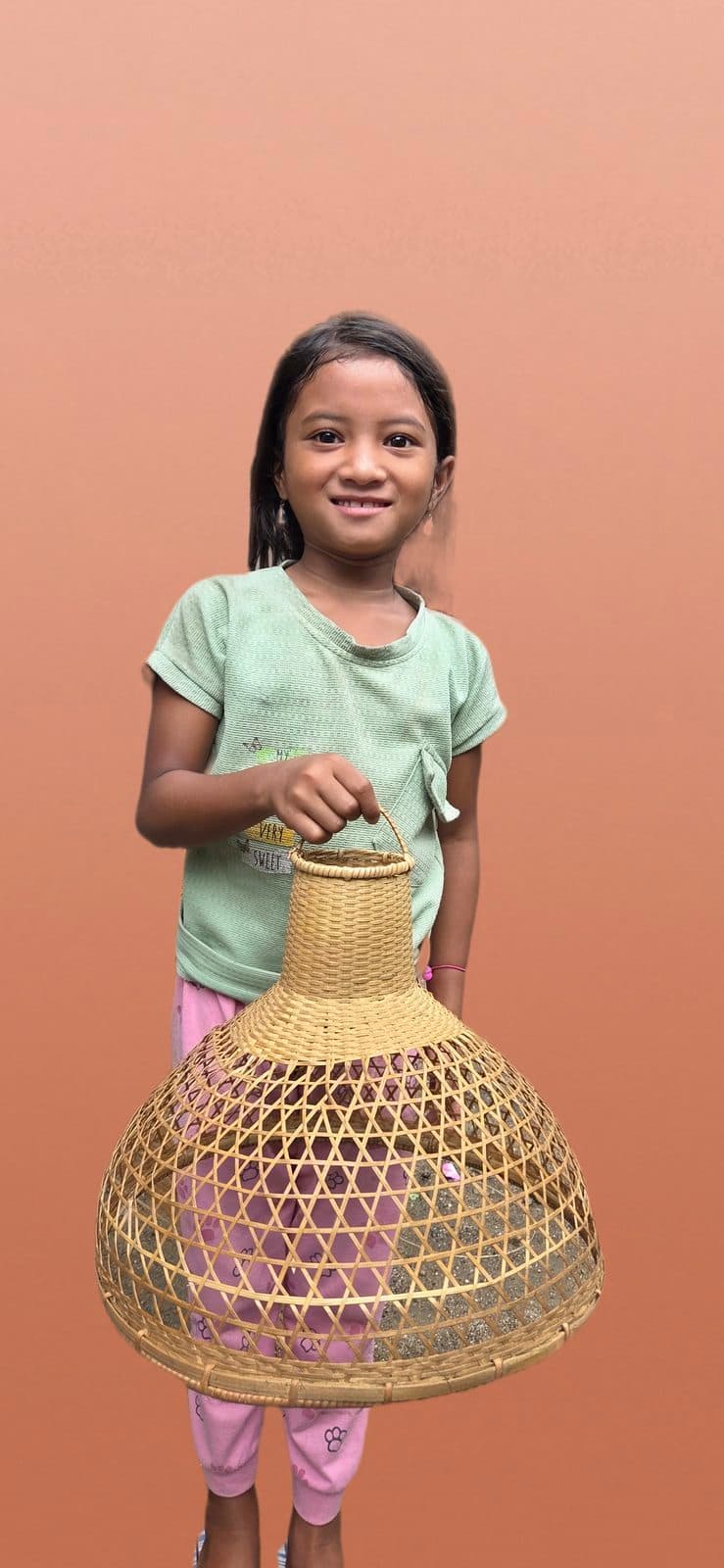 Woven bamboo sun hat worn outdoors