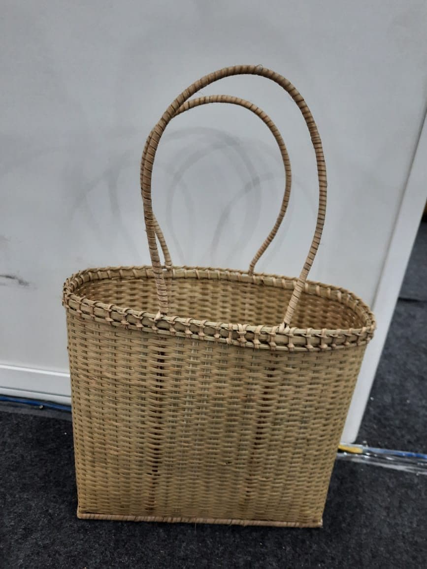 Tall cane shopping tote with long arched handles