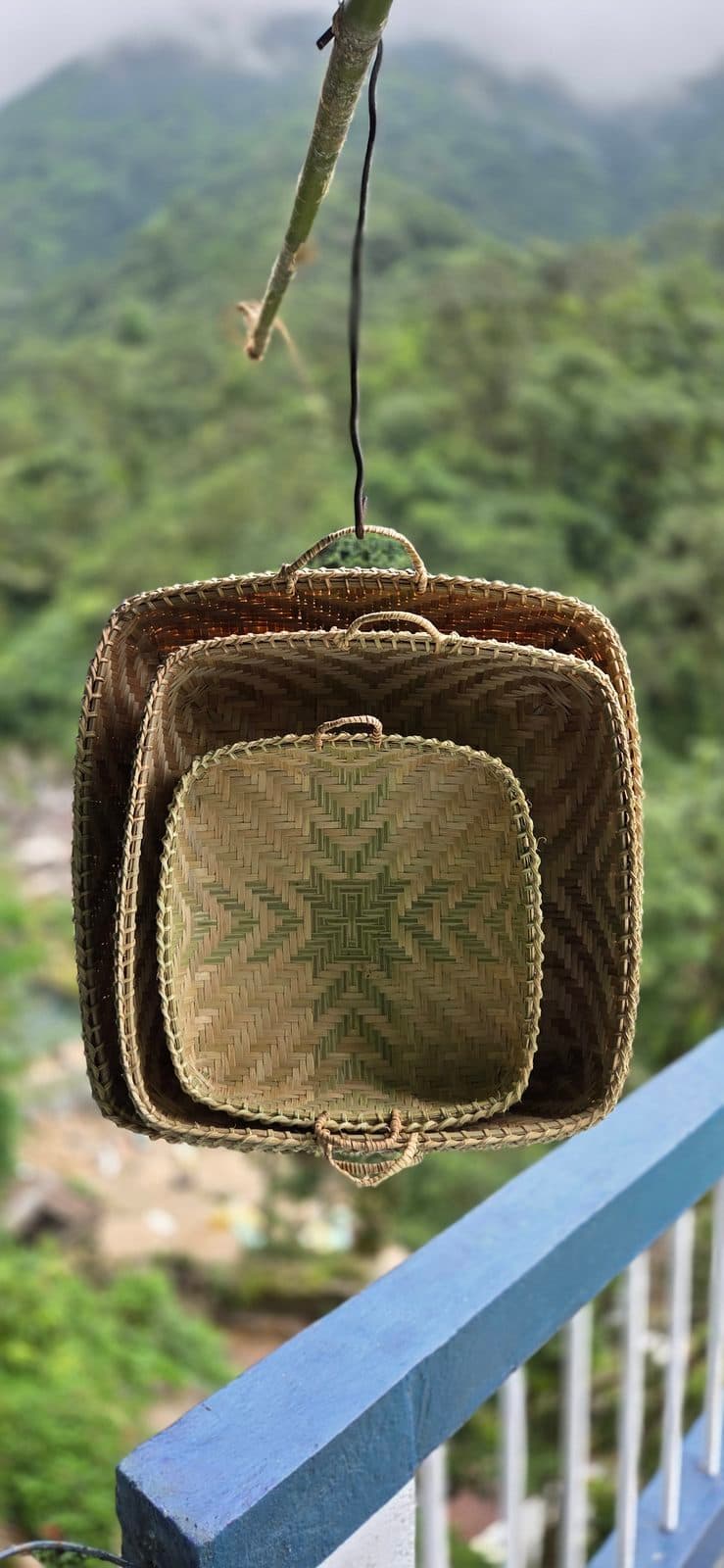 Set of three nesting square bamboo trays with diamond weave pattern