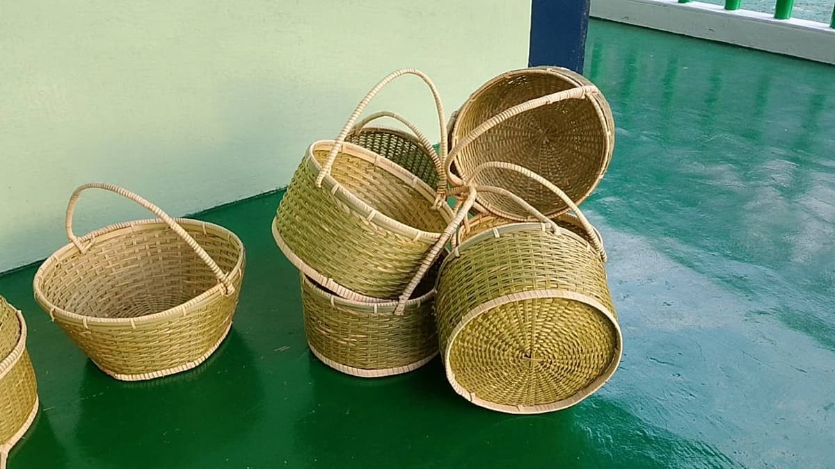 Group of small handled bamboo market baskets
