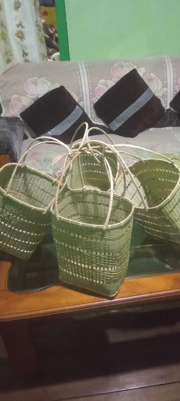Pair of handwoven cane market baskets on a table
